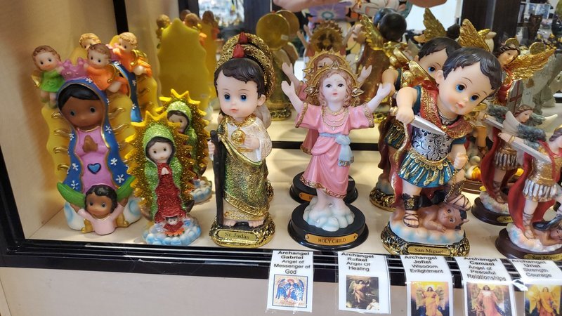 Organized crystal display with labeled stones and healing minerals