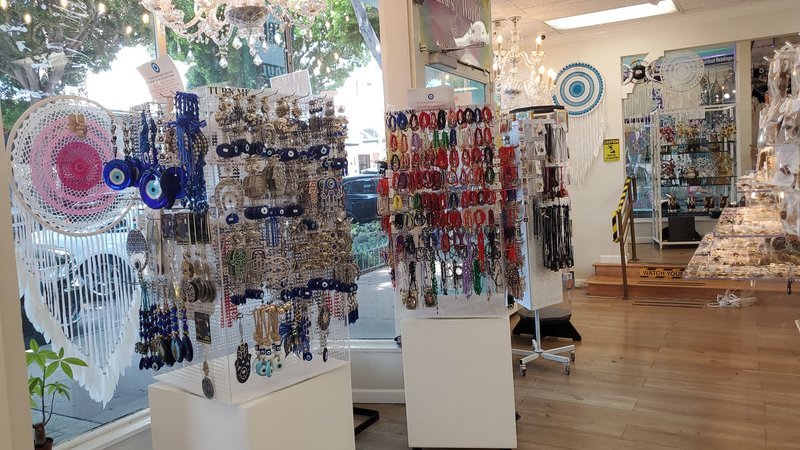 Selection of healing crystals, tumbled stones, and decorative mineral pieces