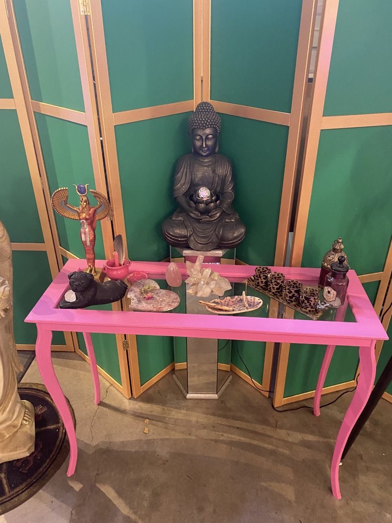 Display of polished crystal specimens, geodes, and mineral towers