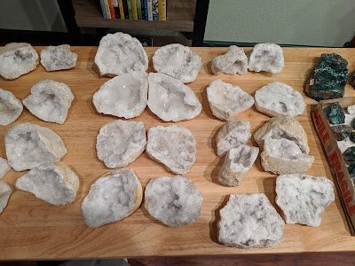 Crystal and mineral display with organized specimens and inventory