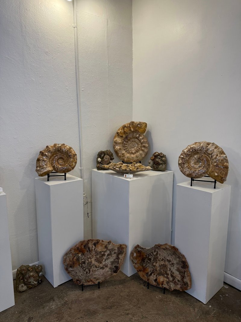 Large amethyst cathedral geode with cream-colored matrix and dark purple crystal interior