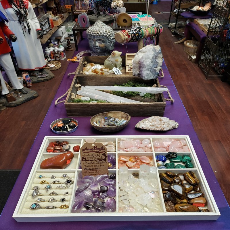 Crystal and mineral specimens including quartz, amethyst, and calcite varieties