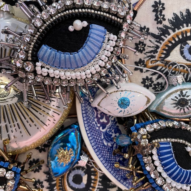 Variety of gemstones, crystal carvings, and polished mineral specimens