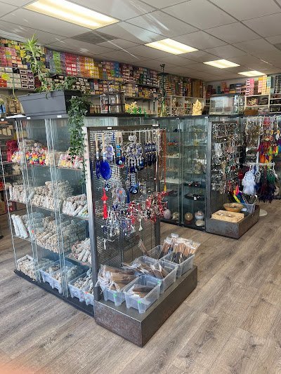 Retail display with tumbled stones, raw crystals, and polished specimens