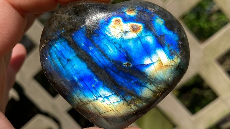 Retail display with tumbled stones, raw crystals, and polished specimens