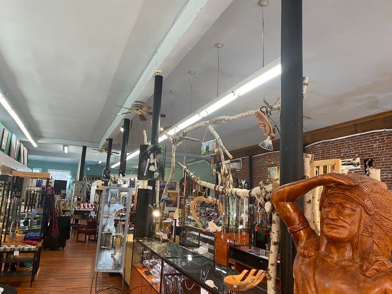 Interior view showcasing crystal towers, spheres, and carved stone pieces