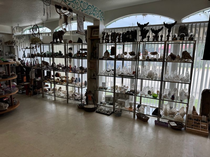 Interior view showcasing crystal towers, spheres, and carved stone pieces