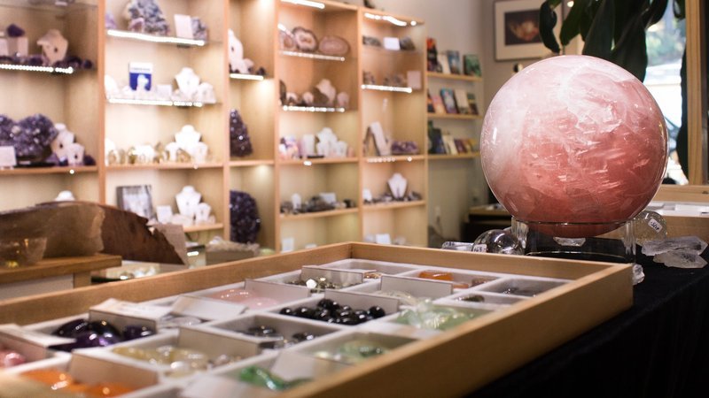 Crystal and mineral display with organized specimens and inventory