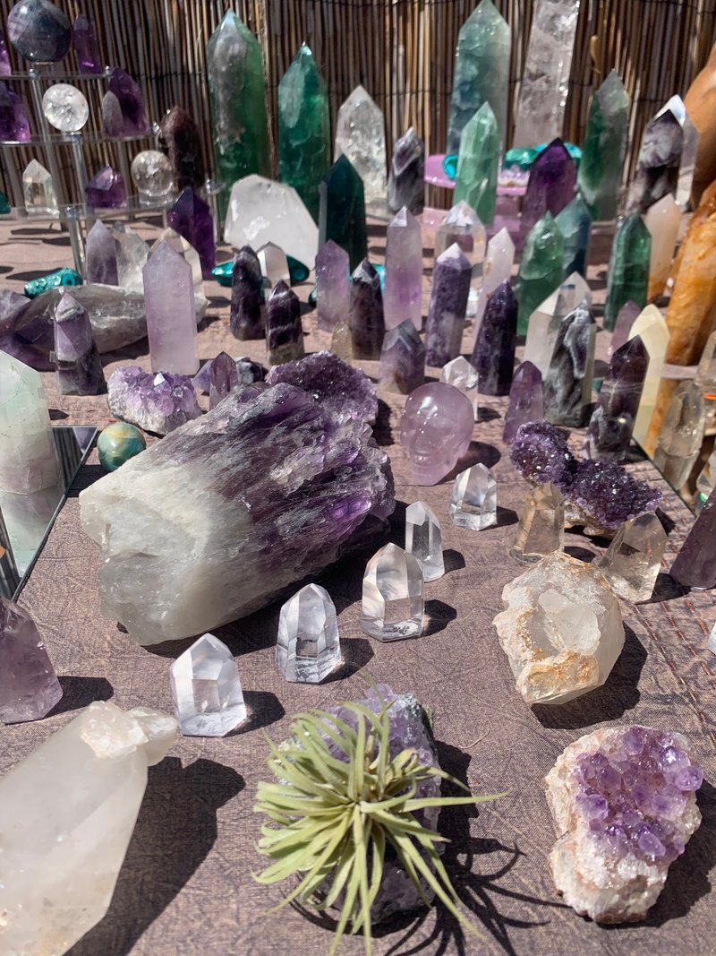 Store interior displaying crystals, minerals, and metaphysical supplies