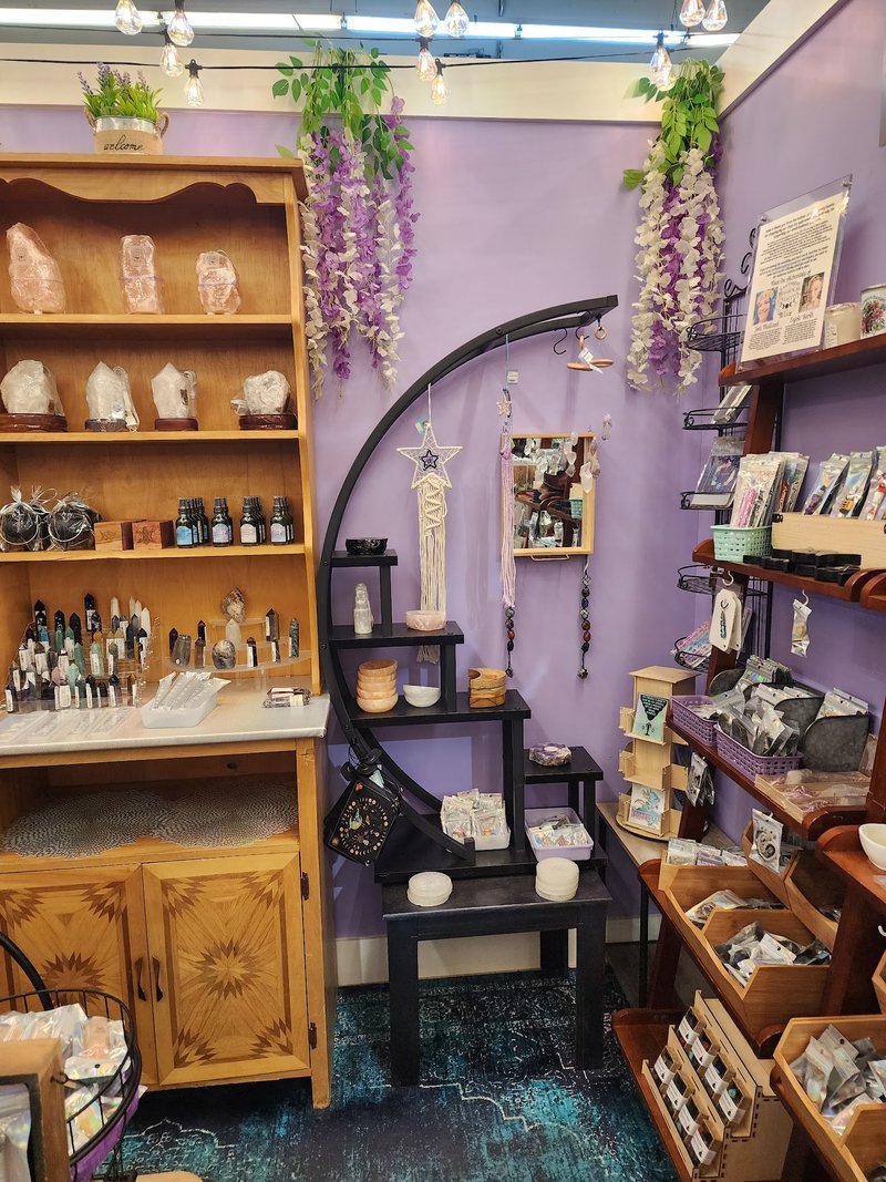 Selection of healing crystals, tumbled stones, and decorative mineral pieces