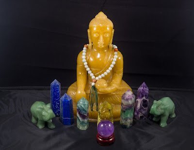Display of polished crystal specimens, geodes, and mineral towers