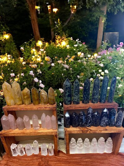 Retail display with tumbled stones, raw crystals, and polished specimens