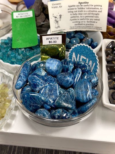 Interior view showcasing crystal towers, spheres, and carved stone pieces