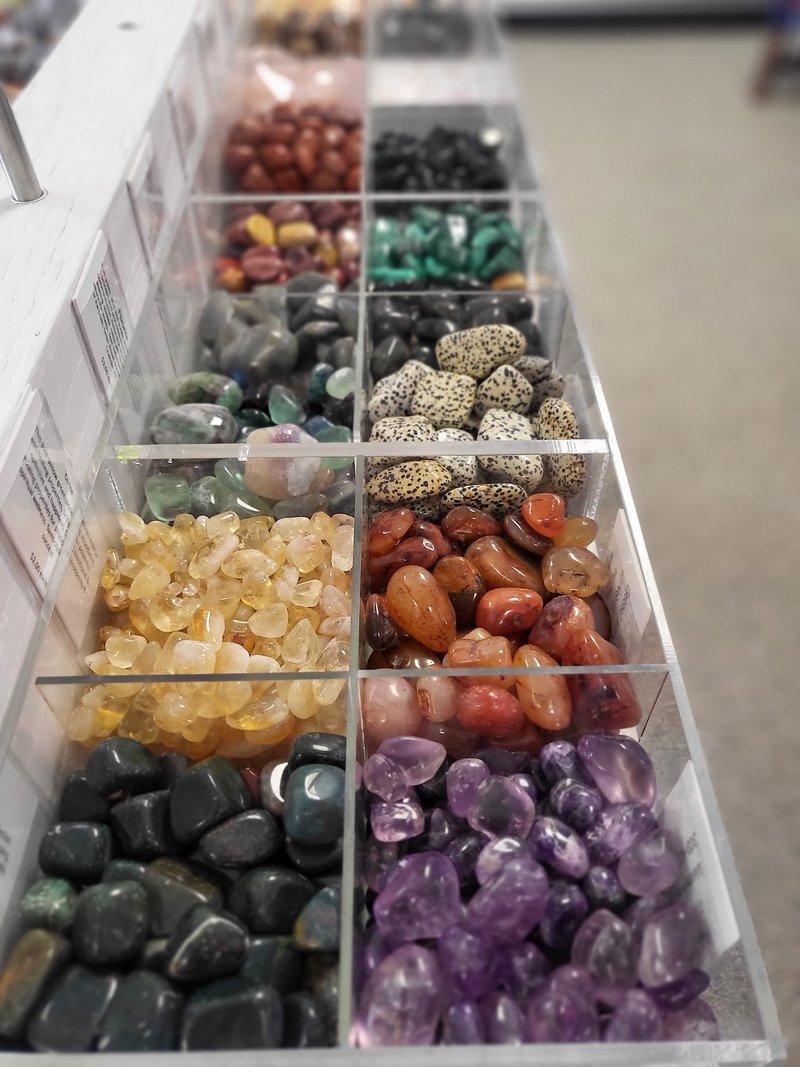Interior view showcasing crystal towers, spheres, and carved stone pieces