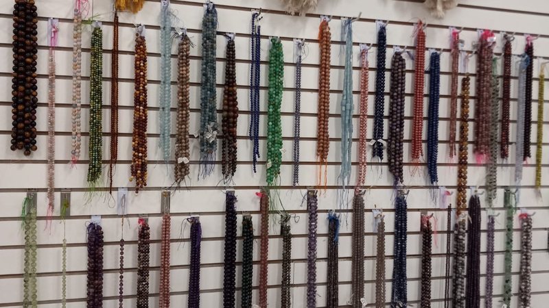 Crystal and mineral display with organized specimens and inventory