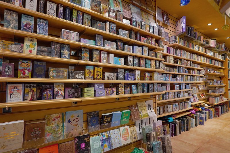 Collection of tumbled stones, raw minerals, and crystal clusters