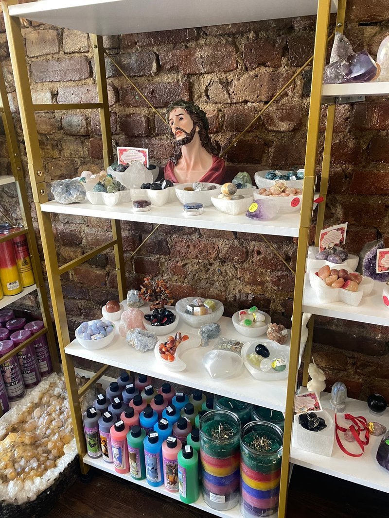 Crystal and mineral specimens including quartz, amethyst, and calcite varieties