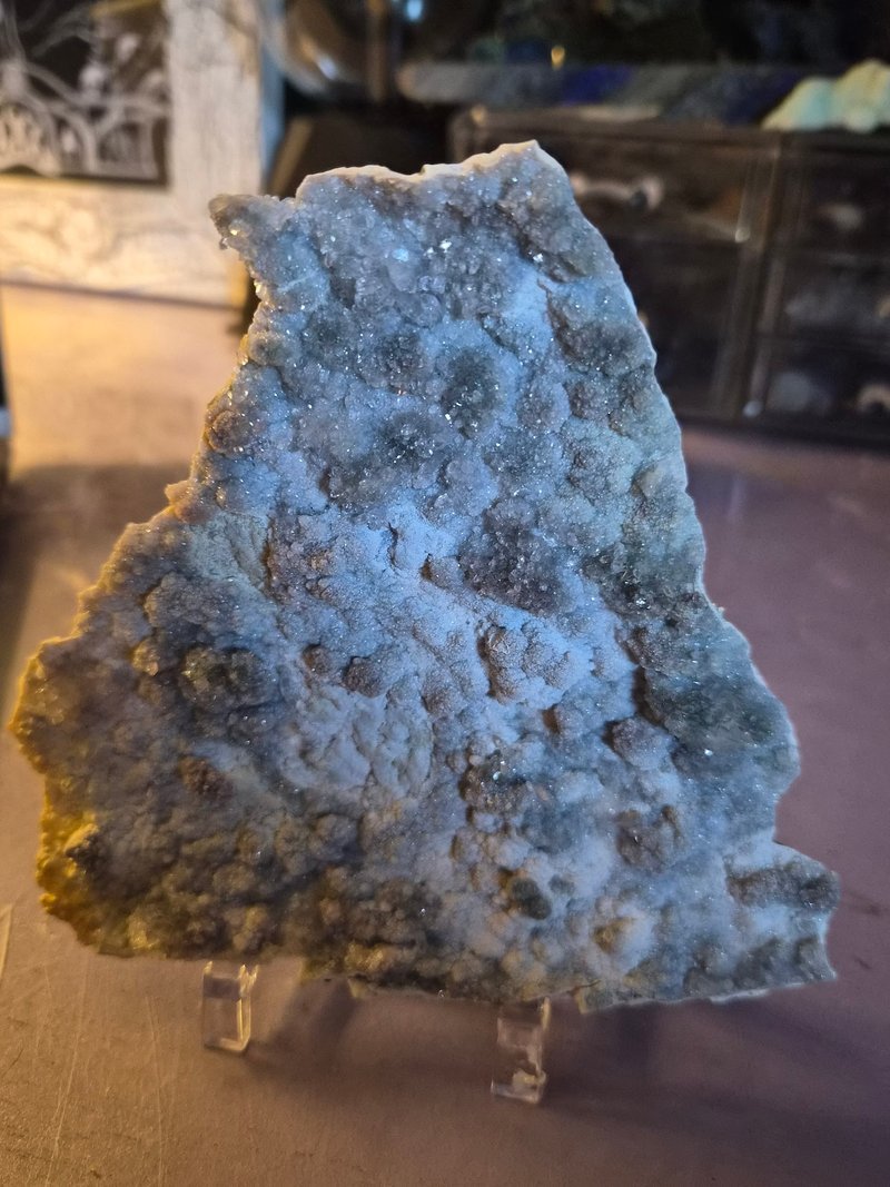 Collection of tumbled stones, raw minerals, and crystal clusters