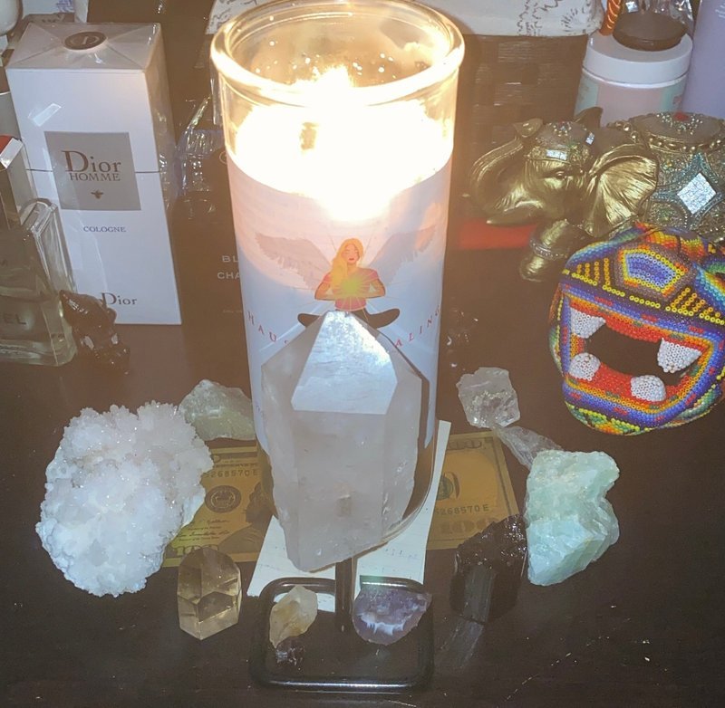 Selection of healing crystals, tumbled stones, and decorative mineral pieces