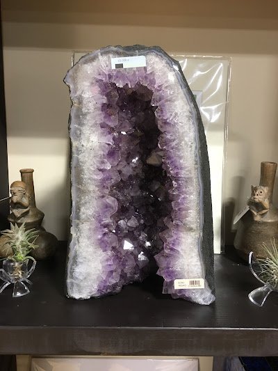 Collection of raw crystals, polished stones, and unique mineral formations