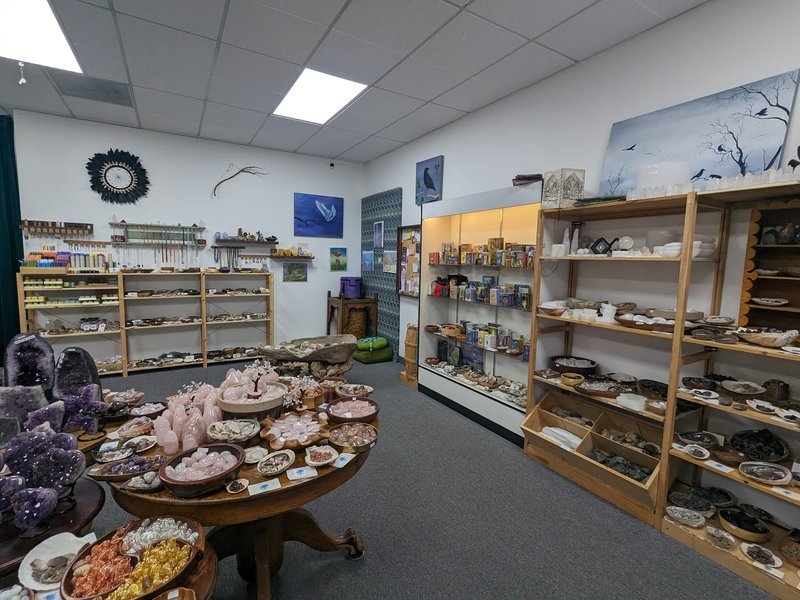 Crystal and mineral specimens including quartz, amethyst, and calcite varieties