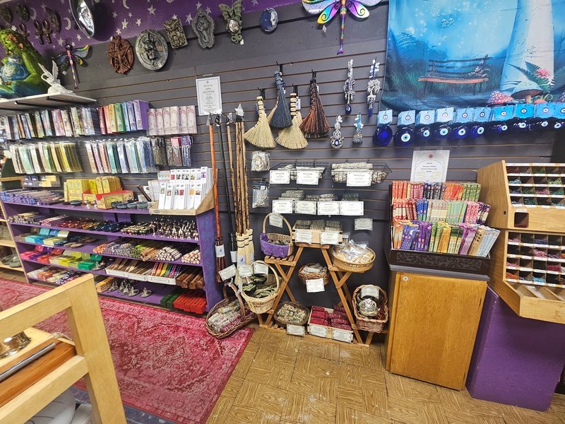 Shop interior featuring gemstones, healing crystals, and spiritual products
