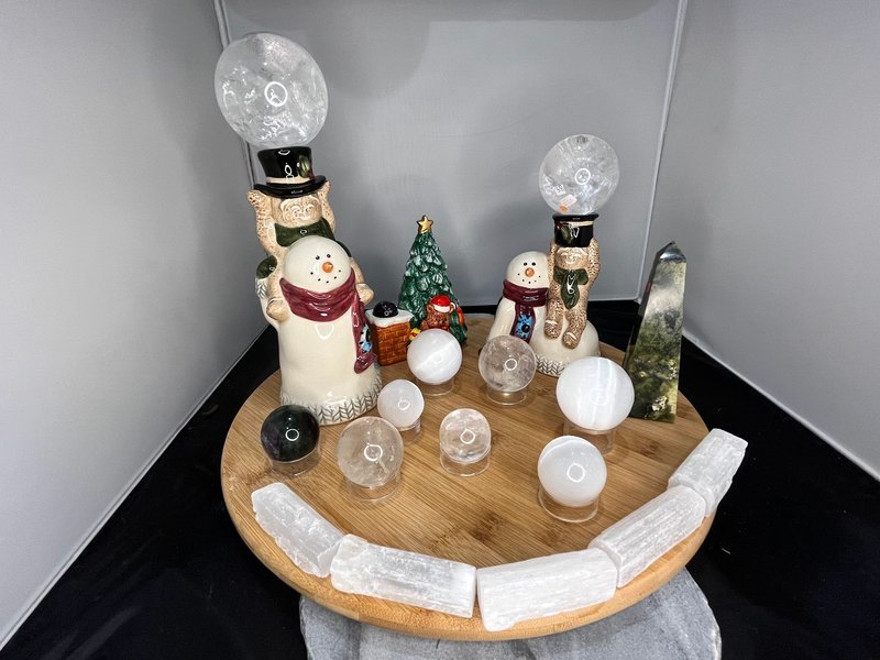 Interior view showcasing crystal towers, spheres, and carved stone pieces