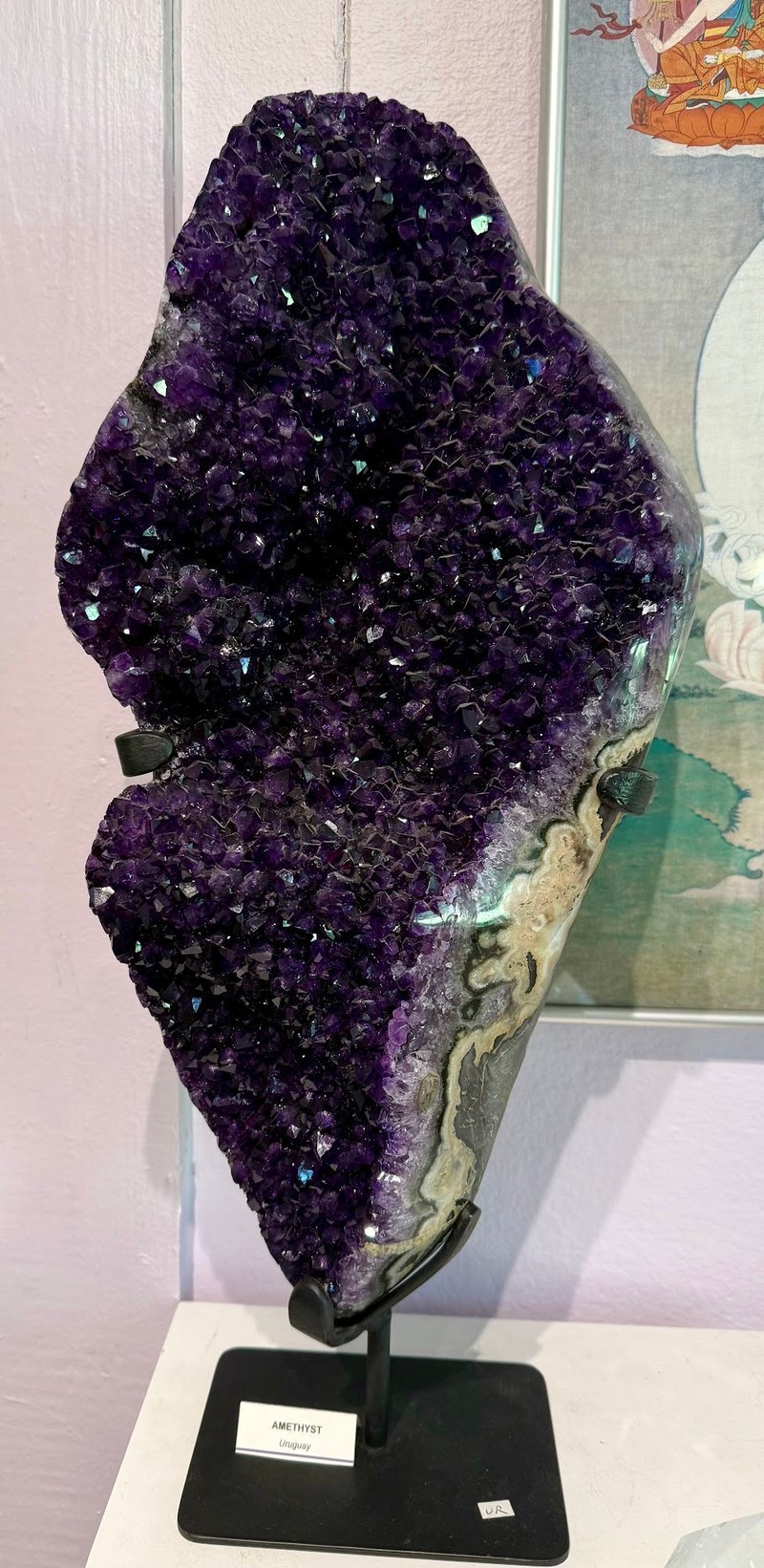 Crystal and mineral specimens including quartz, amethyst, and calcite varieties