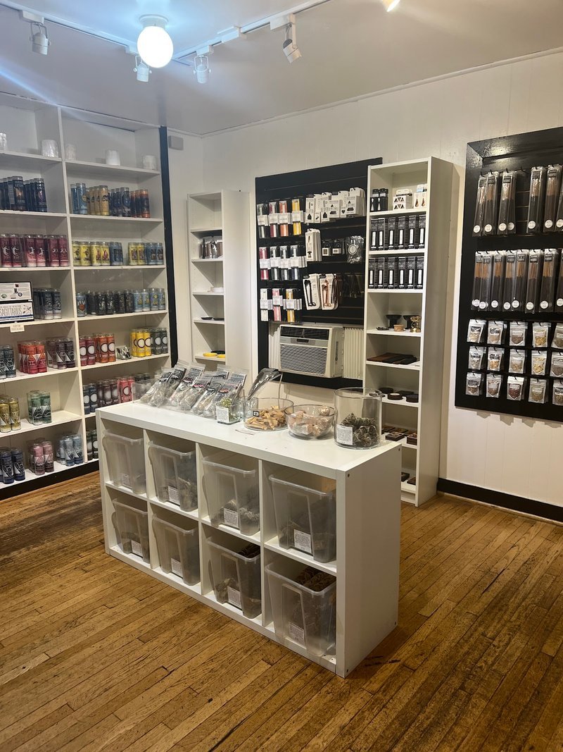 Collection of tumbled stones, raw minerals, and crystal clusters