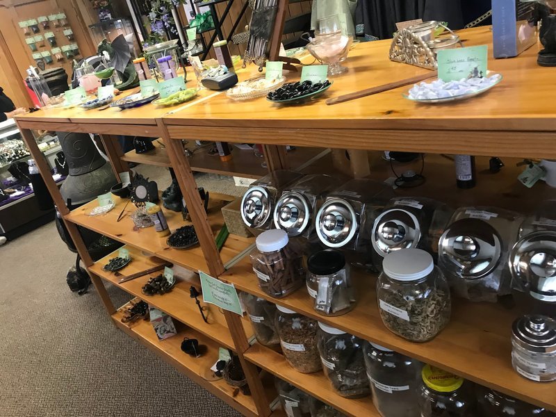 Store interior displaying crystals, minerals, and metaphysical supplies