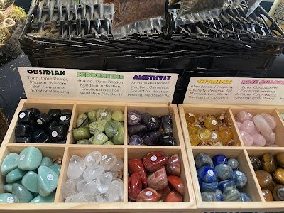 Crystal and mineral specimens including quartz, amethyst, and calcite varieties