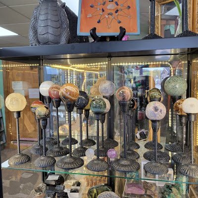 Interior view showcasing crystal towers, spheres, and carved stone pieces