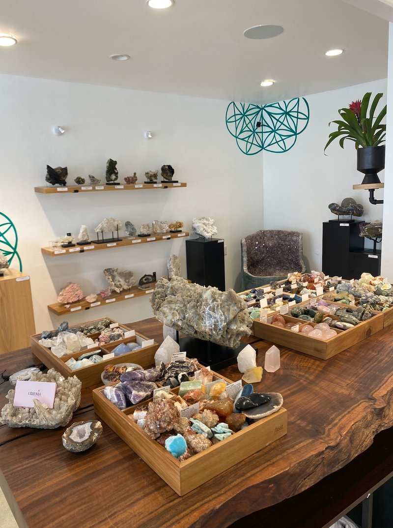 Store interior displaying crystals, minerals, and metaphysical supplies