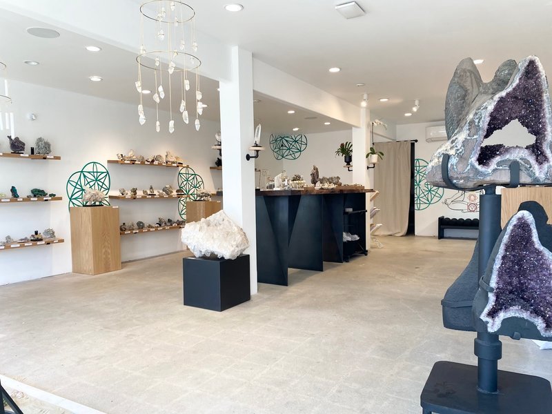 Crystal and mineral specimens including quartz, amethyst, and calcite varieties