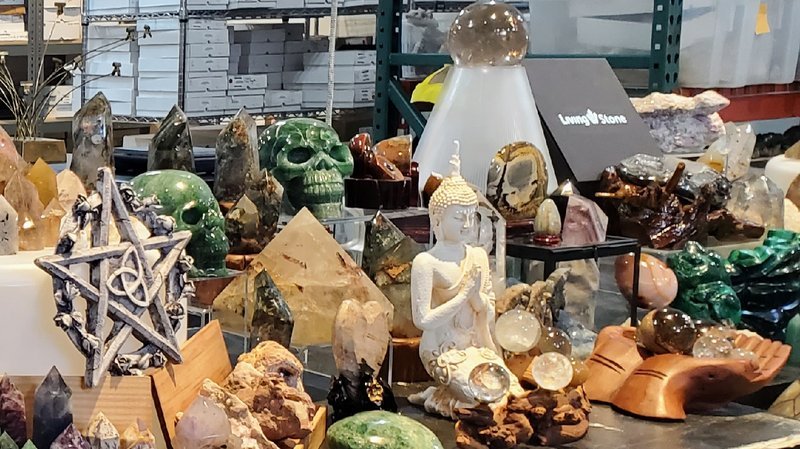 Shop interior featuring gemstones, healing crystals, and spiritual products