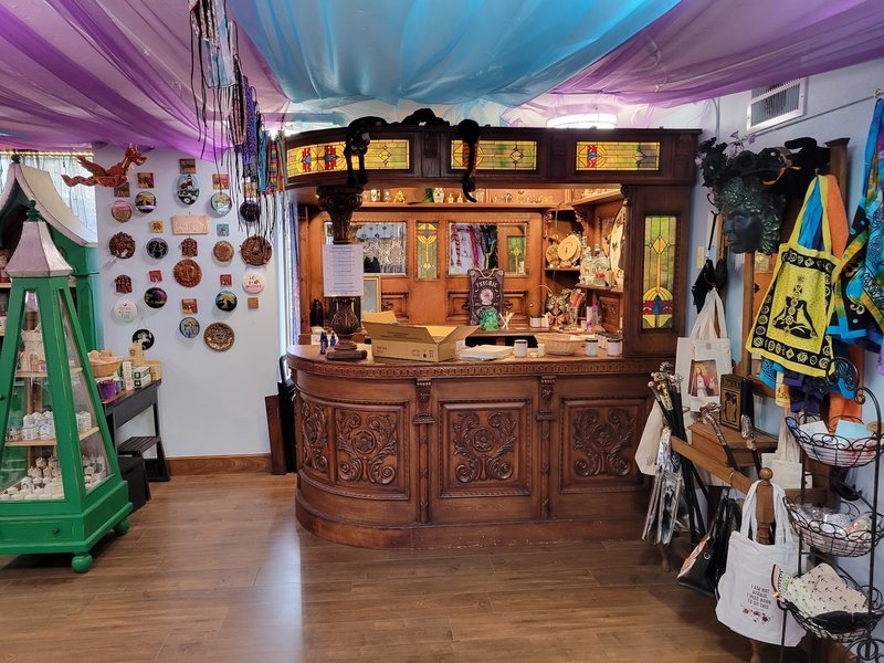 Retail display with tumbled stones, raw crystals, and polished specimens