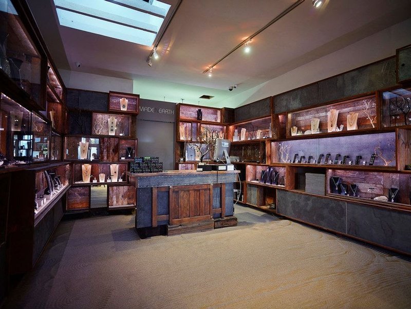 Interior view showcasing crystal towers, spheres, and carved stone pieces
