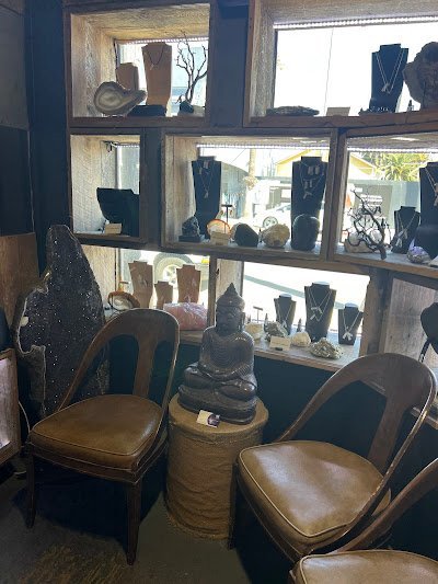 Crystal and mineral specimens including quartz, amethyst, and calcite varieties