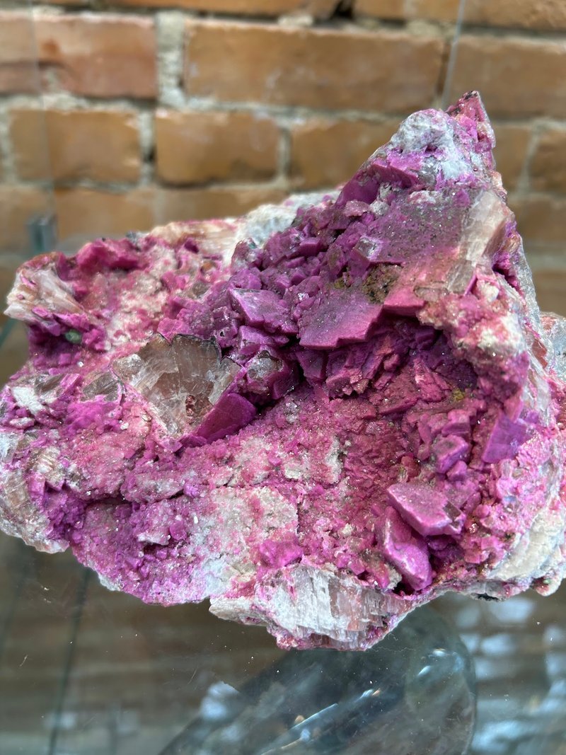 Crystal and mineral specimens including quartz, amethyst, and calcite varieties