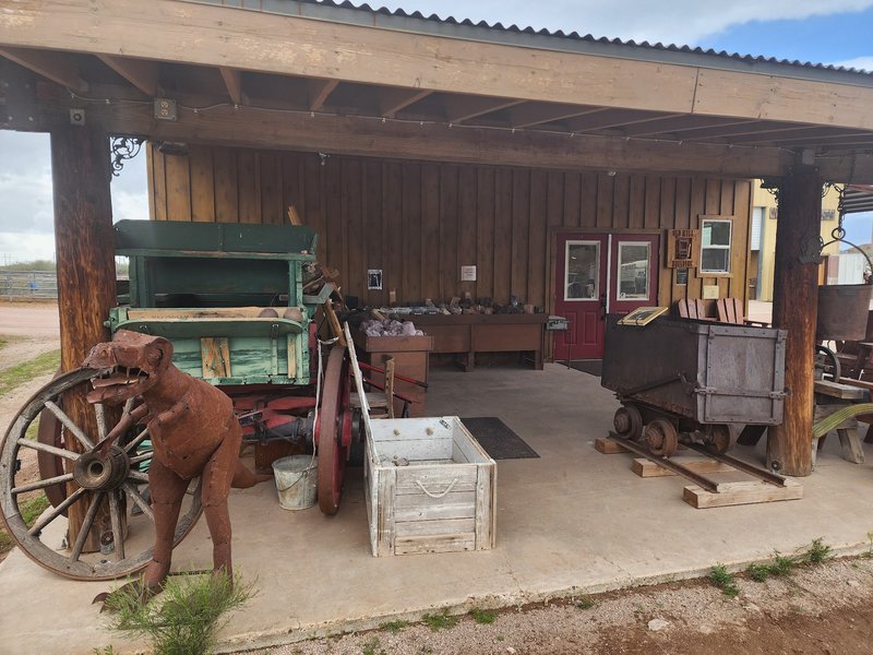 Organized crystal display with labeled stones and healing minerals