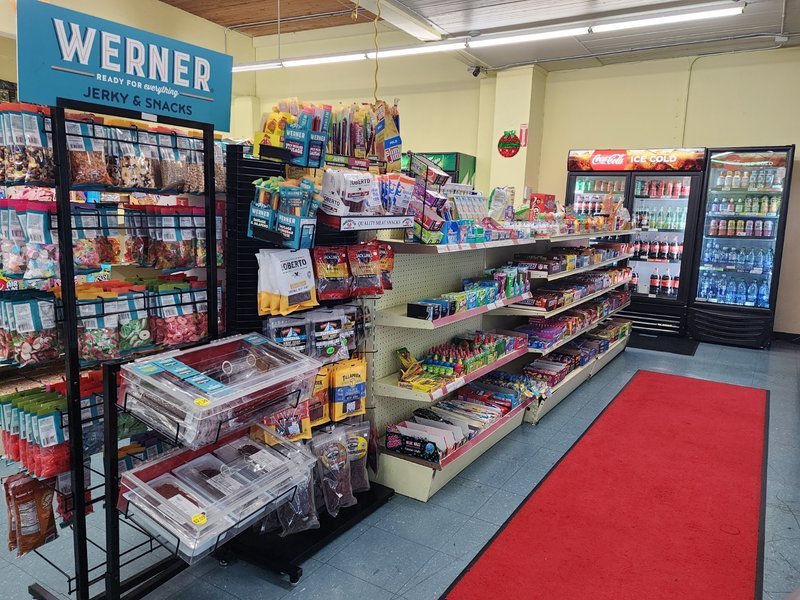 Retail display with tumbled stones, raw crystals, and polished specimens