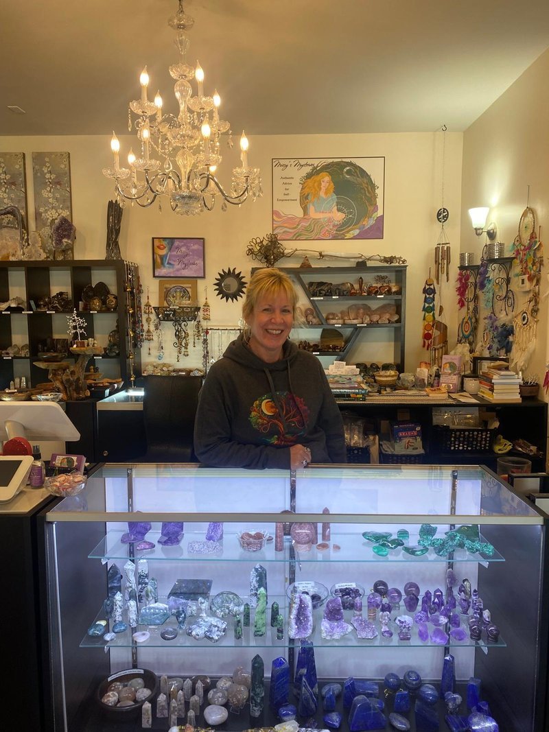 Store interior displaying crystals, minerals, and metaphysical supplies