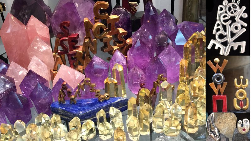 Retail display with tumbled stones, raw crystals, and polished specimens