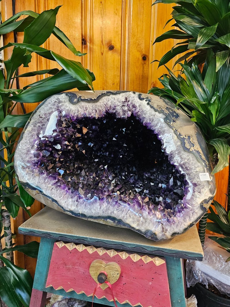 Crystal and mineral specimens including quartz, amethyst, and calcite varieties