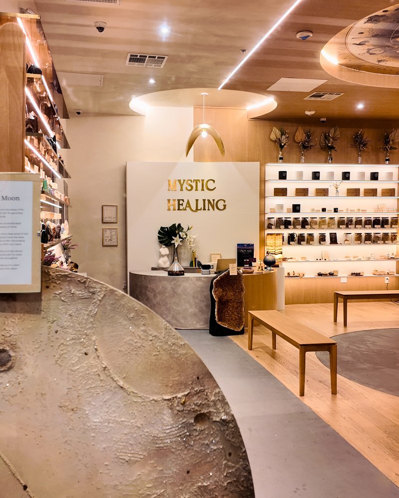 Selection of healing crystals, tumbled stones, and decorative mineral pieces