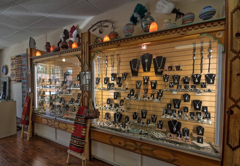 Interior view showcasing crystal towers, spheres, and carved stone pieces