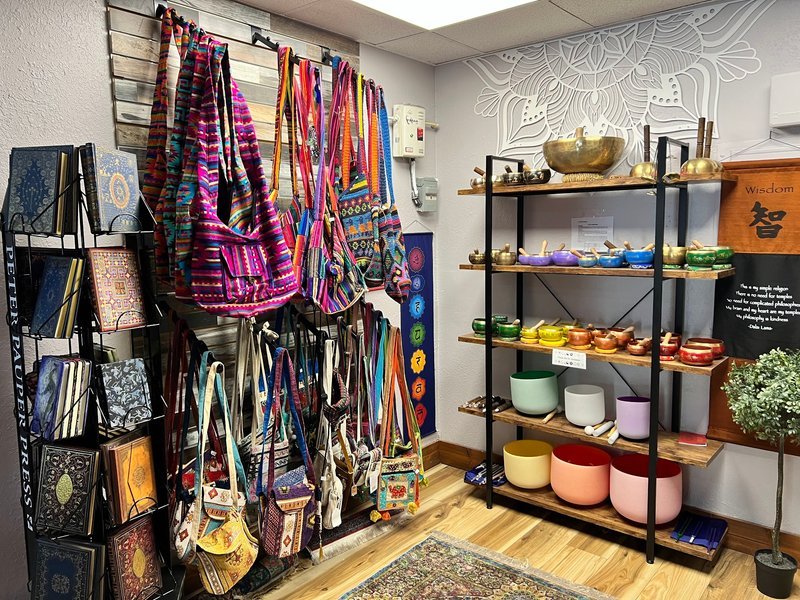 Display of polished crystal specimens, geodes, and mineral towers