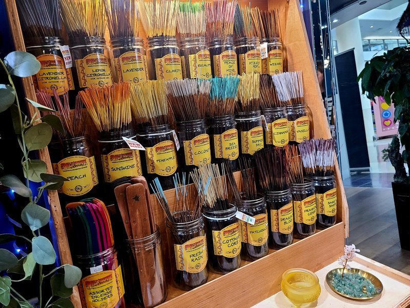 Shop interior featuring gemstones, healing crystals, and spiritual products