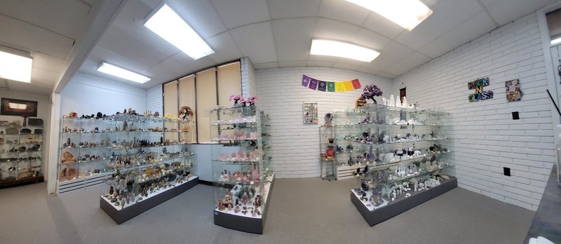 Retail display with tumbled stones, raw crystals, and polished specimens