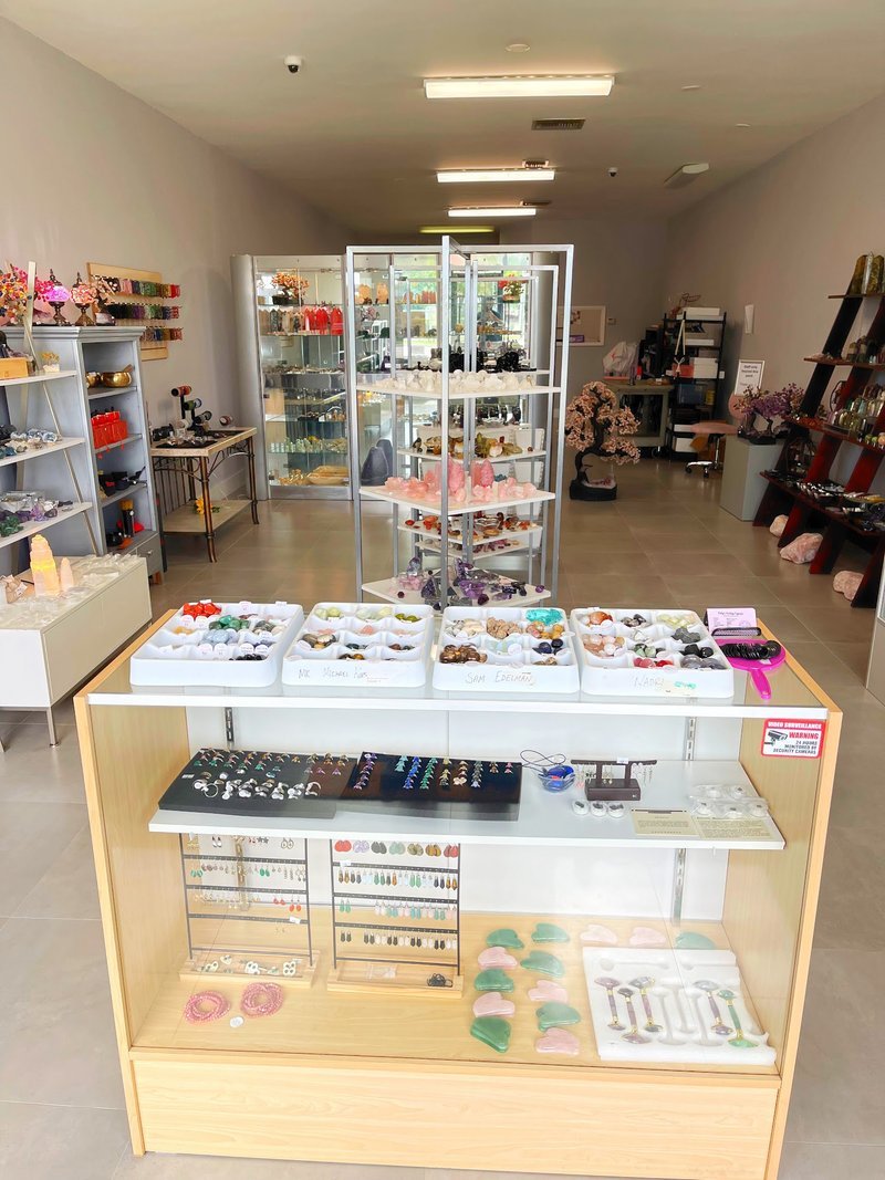 Interior view showcasing crystal towers, spheres, and carved stone pieces